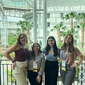 NSNA 2023 DUSNA Executive Board pictured in hotel lobby, left to right, Claire Manger '24, Meg Foster '23, Camryn Amen '23, Grace Sutton '24